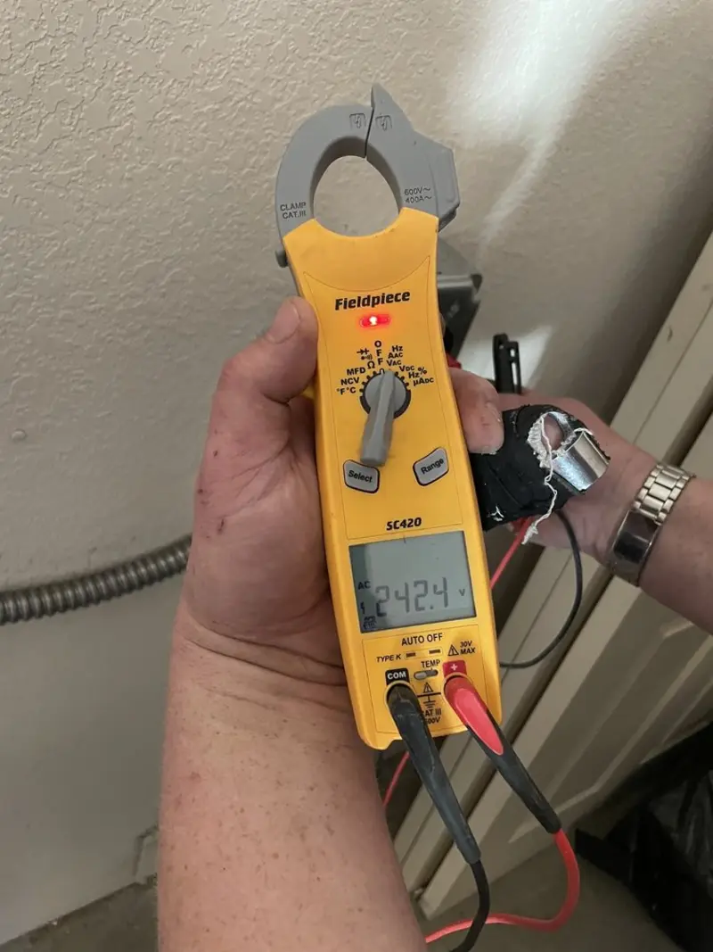 Voltage testing with clamp meter during Outlet Installation in Jamul